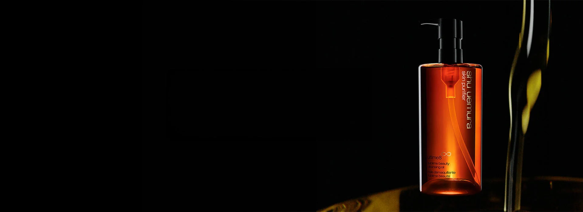 shu uemura cleansing oil in black background